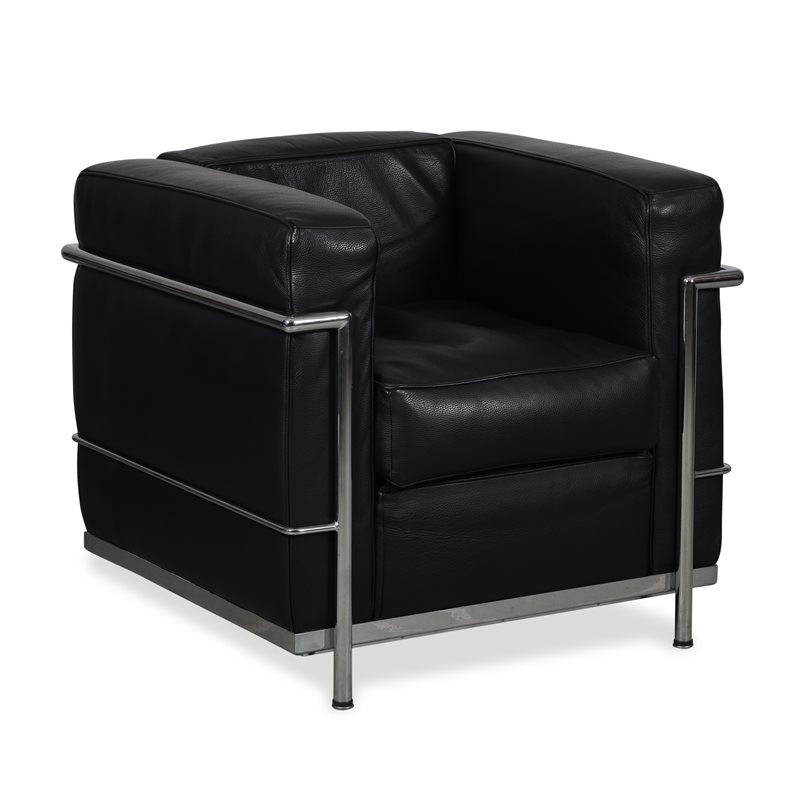 Loungestol. Sort læder. Krom stel. 